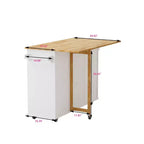 Isola cucina moderna con piano a ribalta e cassetti, carrello da cucina mobile con ripiani, armadio contenitore con tavolo da pranzo pieghevole